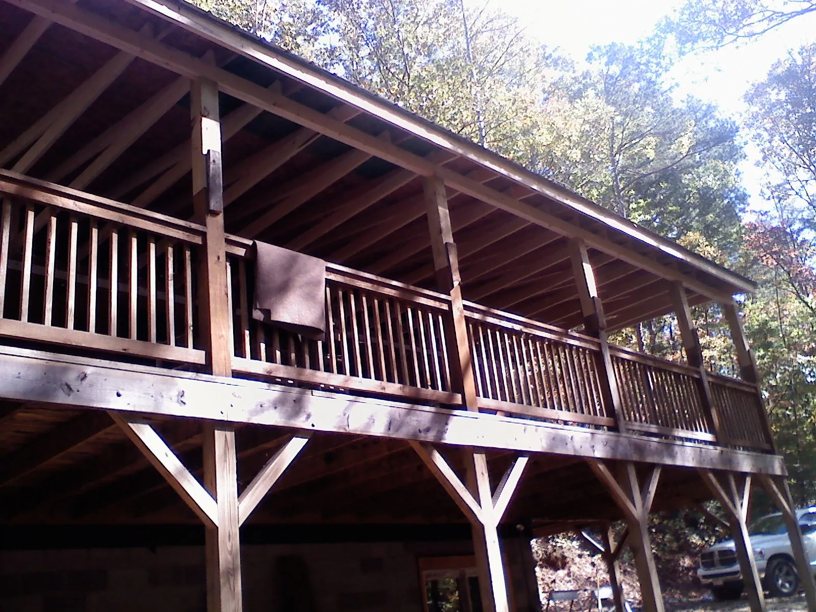 Timber framing under a new elevated porch and deck — Roof Leak Repair in Gainesboro by Roofing Brothers